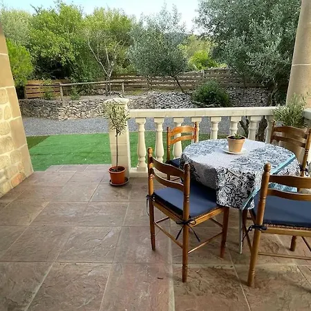 Holiday home Captivating 2-bed, 1 Bath Cottage, Private Garden & Shared Pool In *